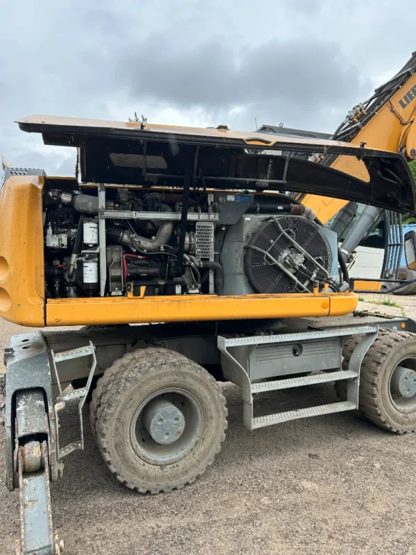 matériel tp occasion pelle sur pneus excavator liebherr gsc négoce