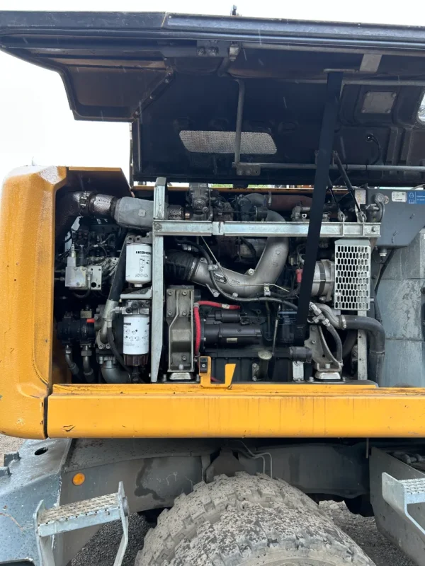 matériel tp occasion pelle sur pneus excavator liebherr gsc négoce