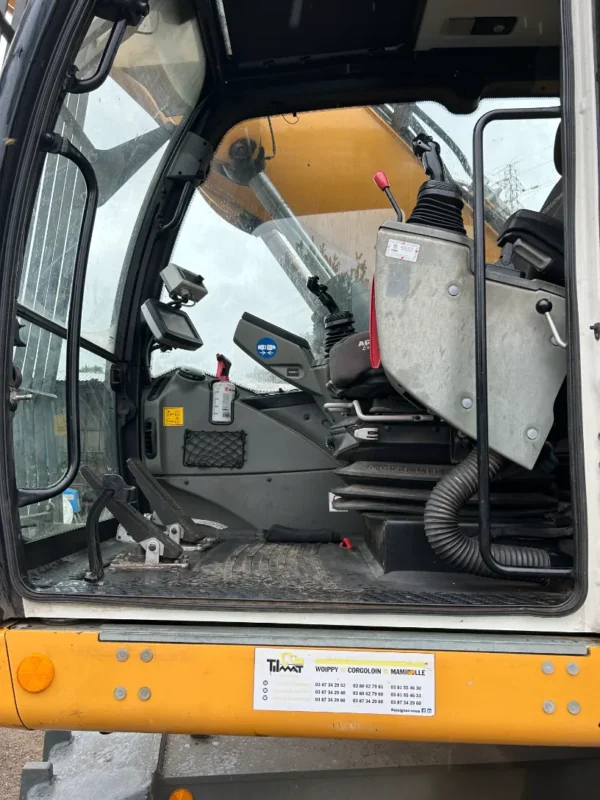 matériel tp occasion pelle sur pneus excavator liebherr gsc négoce